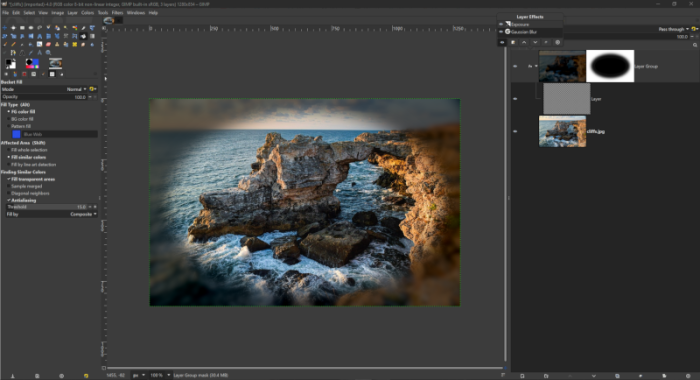 Image showing how a layer group with adjustment layers and set to pass through can apply them to an underlying layer